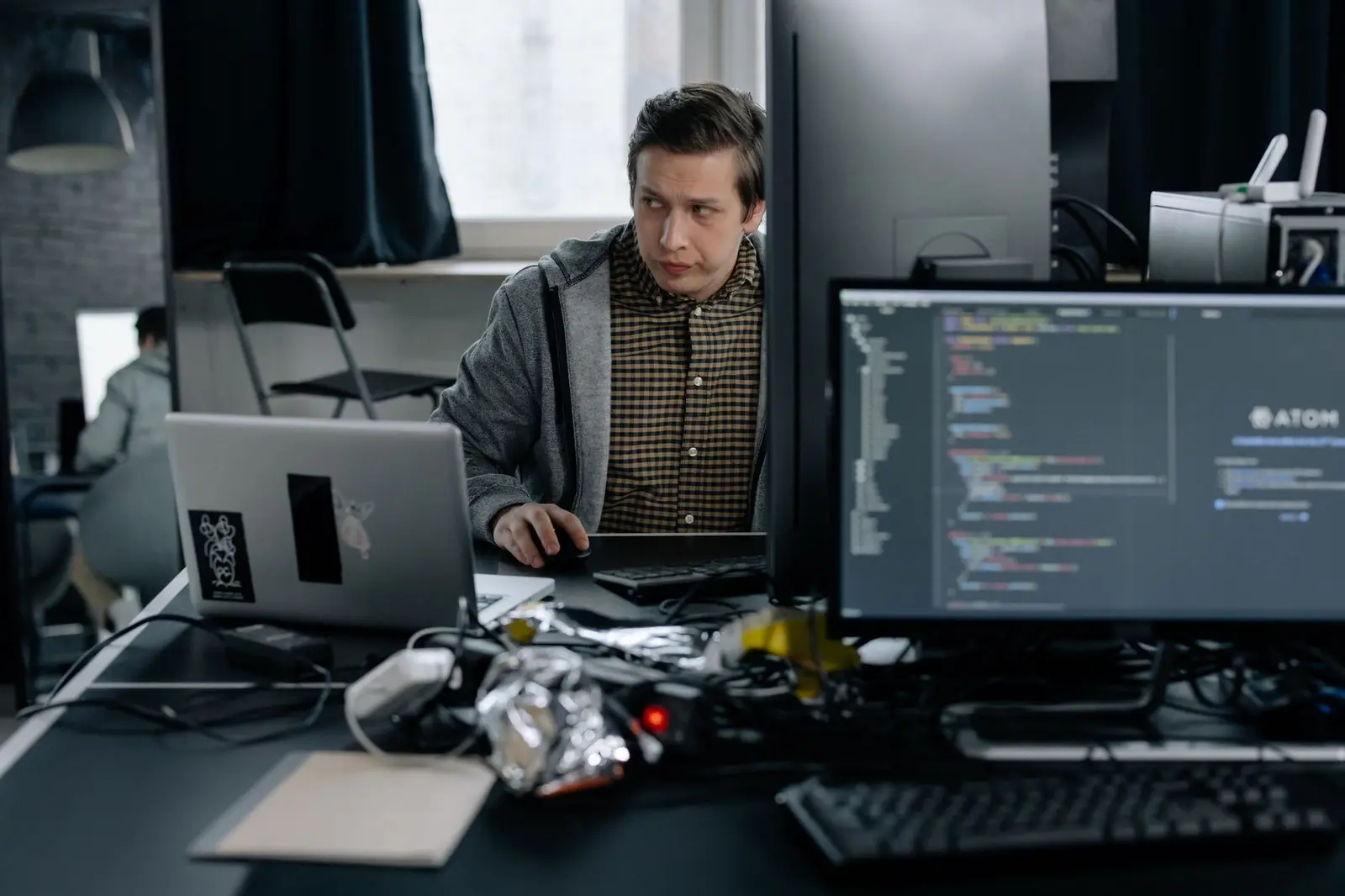 IT professional working at a workstation.