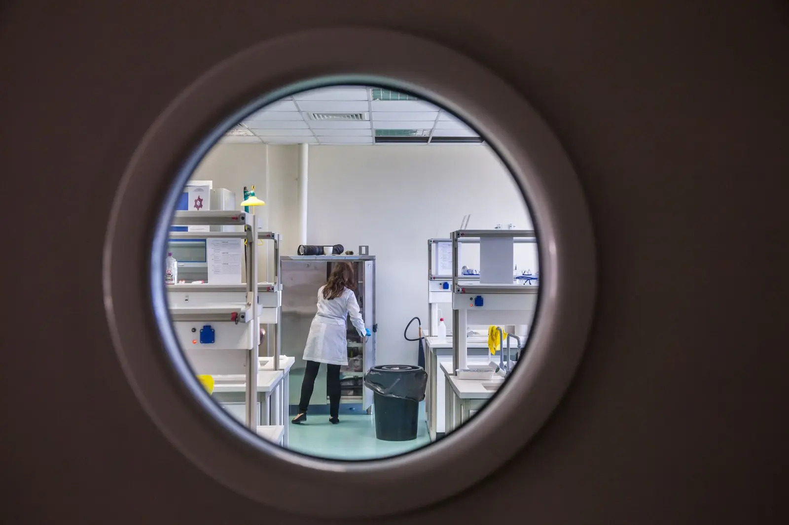 Scientist working in a modern pharmaceutical laboratory.